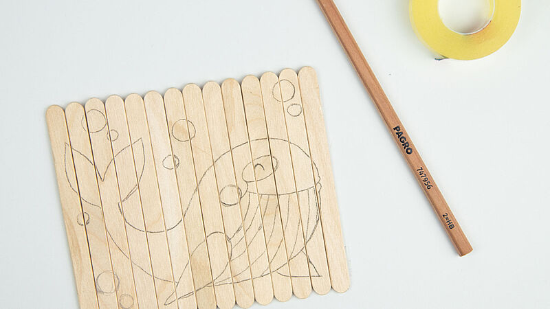Holzstäbchen mit Zeichnung